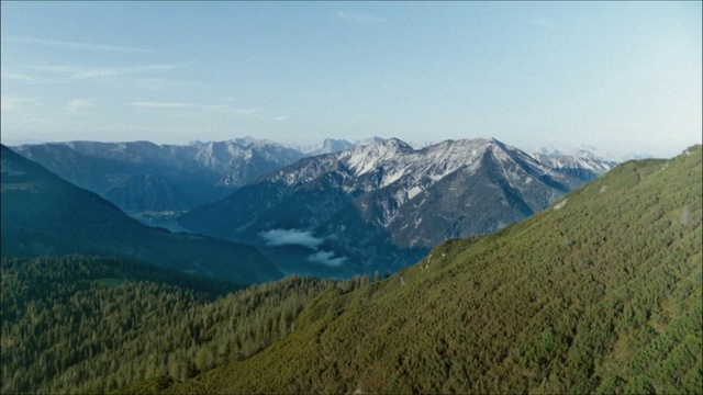 Video Reference: Sky, Mountain, Cloud, Natural landscape, Slope, Tree, Plant, Landscape, Grassland, Grass