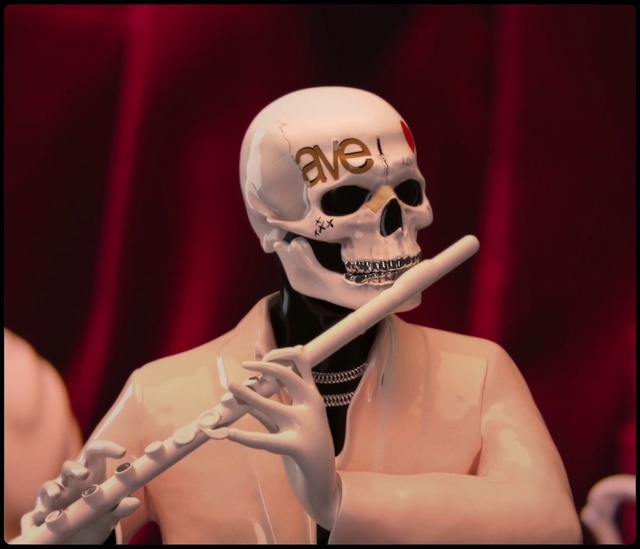 Video Reference: Head, Human body, Jaw, Gesture, Bone, Entertainment, Music artist, Performing arts, Hat, Skeleton