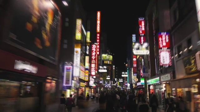Video Reference: Building, Skyscraper, Electricity, Sky, City, Metropolitan area, Road, Cityscape, Electronic signage, Midnight
