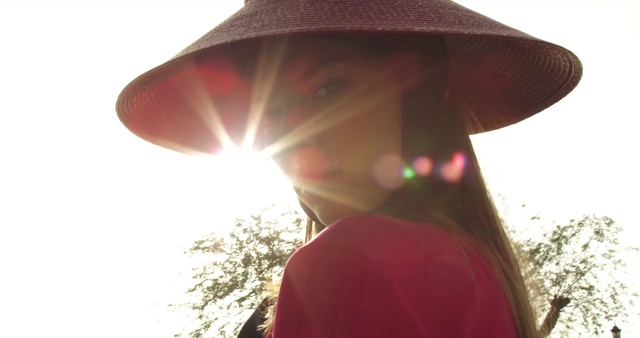 Video Reference: Clothing, Sky, Hat, Sunlight, Tree, Red, Happy, Sun hat, Shade, Tints and shades