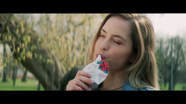 Video Reference: Lip, Flash photography, Eyelash, Happy, Gesture, Grass, Plant, People in nature, Drink, Ice cream
