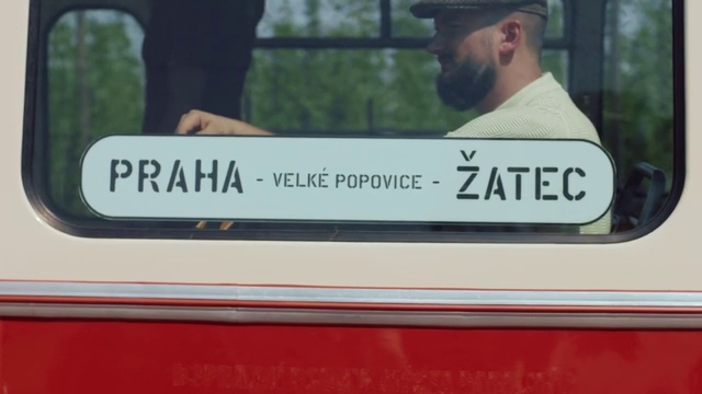 Video Reference: Hat, Motor vehicle, Cap, Baseball cap, Font, Automotive exterior, Beard, Signage, Advertising, Sun hat
