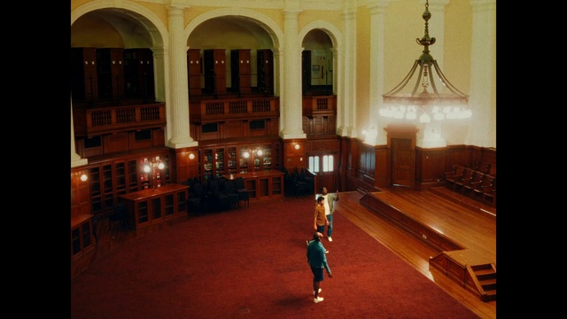 Video Reference: Interior design, Hall, Flooring, Building, Bench, City, Event, Room, Holy places, Symmetry