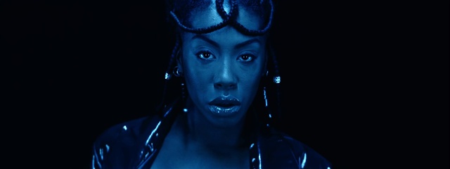 Video Reference: Eyebrow, Eyelash, Blue, Flash photography, Purple, Entertainment, Black hair, Cg artwork, Performing arts, Electric blue