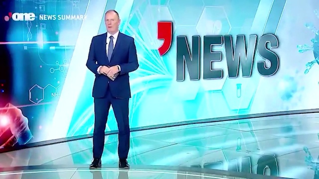 Video Reference: World, Azure, Coat, Suit, Blazer, Font, White-collar worker, Formal wear, Electric blue, Tie