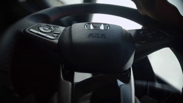 Video Reference: Vehicle, Steering part, Car, Motor vehicle, Steering wheel, Automotive mirror, Automotive design, Personal luxury car, Automotive wheel system, Family car