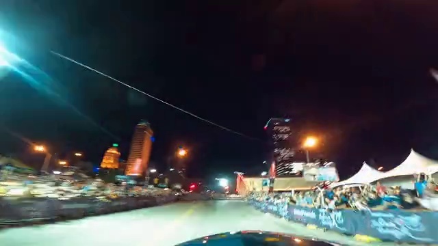 Video Reference: Sky, Street light, Building, Automotive lighting, Electricity, City, Road surface, Metropolitan area, Road, Midnight
