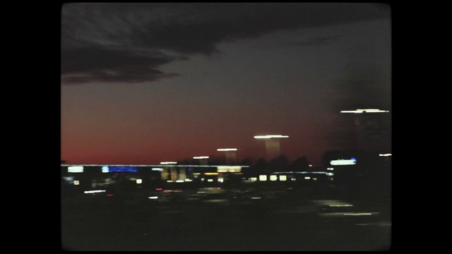 Video Reference: Sky, Cloud, Rectangle, Building, Gas, Font, Tints and shades, Horizon, Fixture, City