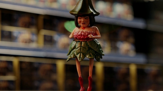 Video Reference: Hair, Head, Toy, Doll, Human body, Street fashion, Witch hat, Headgear, Fashion design, Wood