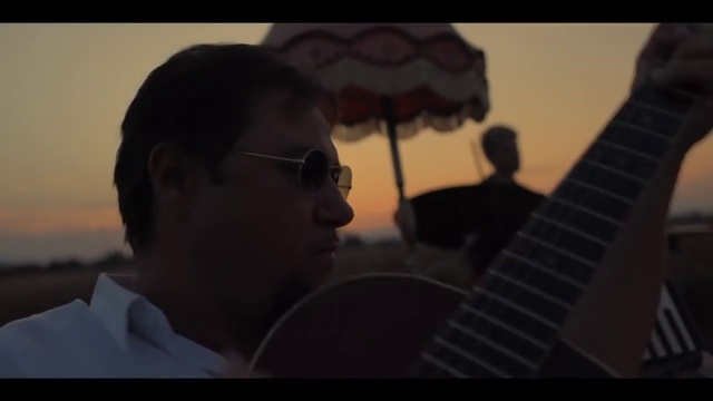 Video Reference: Guitar, Musical instrument, Vision care, Guitar accessory, Musician, Flash photography, Plucked string instruments, String instrument accessory, Musical instrument accessory, String instrument