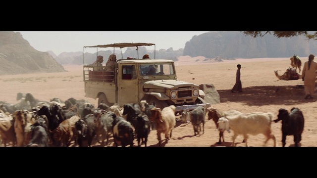 Video Reference: Wheel, Vehicle, Tire, Sky, Motor vehicle, Working animal, Car, Travel, Landscape, Rural area