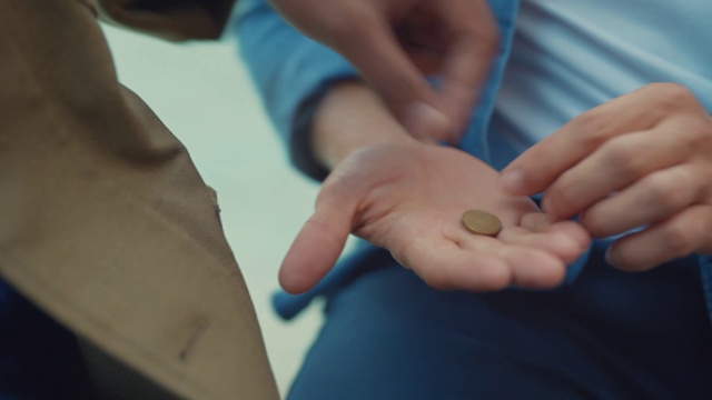 Video Reference: Finger, Gesture, Nail, Thumb, Blood vessel, Wrist, Electric blue, Service, Vein, Event