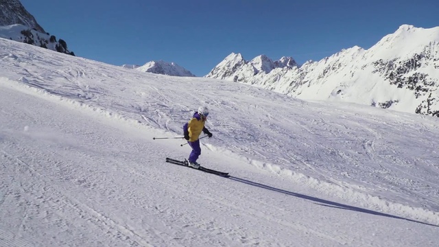 Video Reference: Sky, Cloud, Sports equipment, Snow, Mountain, Ski, Ski boot, Slope, Ski Equipment, Tree