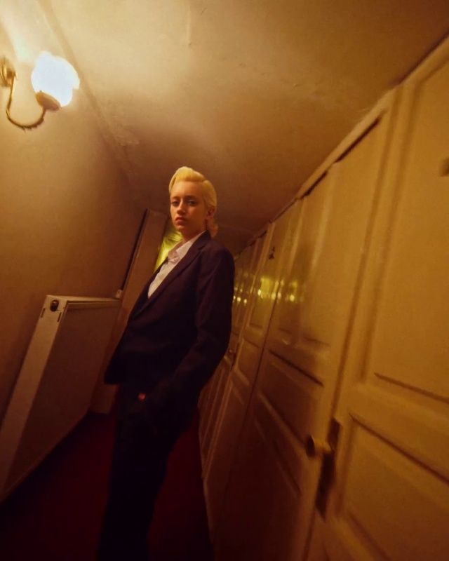 Video Reference: Flash photography, Sky, Orange, Suit, Blazer, Tints and shades, Fun, Formal wear, Space, Wood