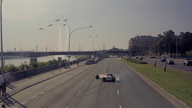 Video Reference: Sky, Car, Street light, Vehicle, Road surface, Asphalt, Motor vehicle, Plant, Thoroughfare, Truck