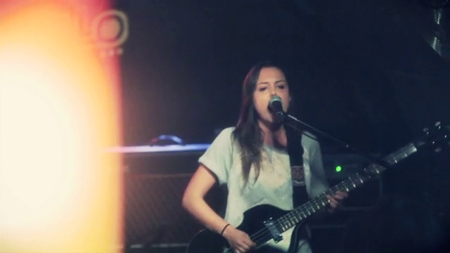 Video Reference: Hair, Microphone, Musical instrument, Guitar, Musician, Concert, Music artist, String instrument, Guitar accessory, Human body