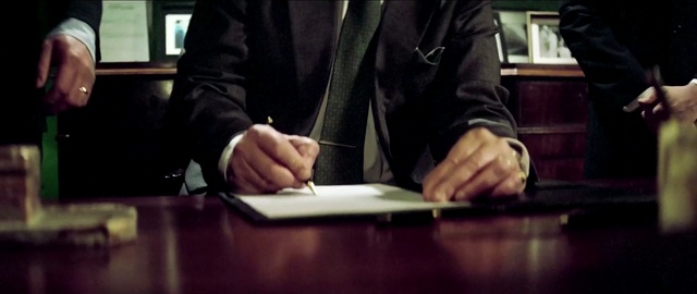Video Reference: Hand, Table, Arm, Gesture, Finger, Blazer, White-collar worker, Thumb, Nail, Font