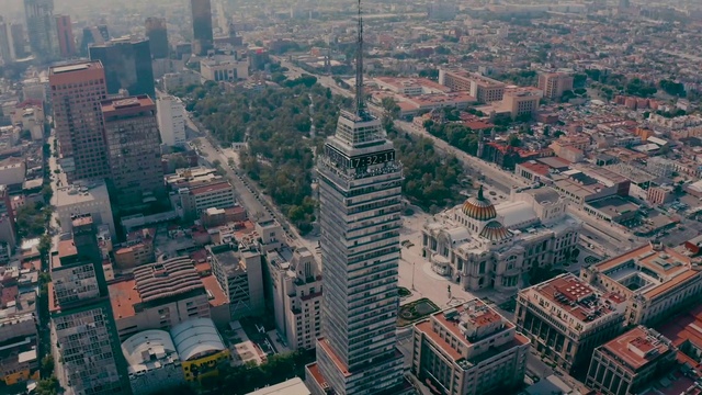 Video Reference: Skyscraper, Building, Daytime, Property, Tower, World, Infrastructure, Natural environment, Water, Tower block