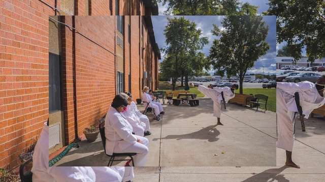 Video Reference: Daytime, Road surface, Building, Window, Architecture, Tree, Urban design, Sidewalk, Chair, Leisure