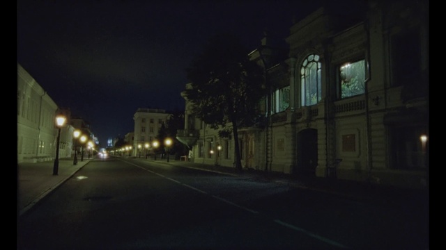 Video Reference: Building, Window, Automotive lighting, Street light, Road surface, Sky, Electricity, Atmospheric phenomenon, Asphalt, Midnight