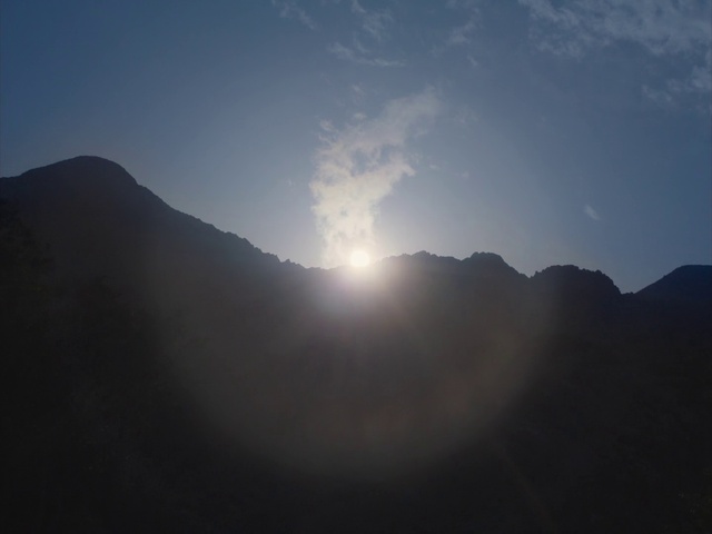 Video Reference: Sky, Cloud, Atmosphere, Mountain, Cumulus, Sunrise, Landscape, Astronomical object, Horizon, Lens flare
