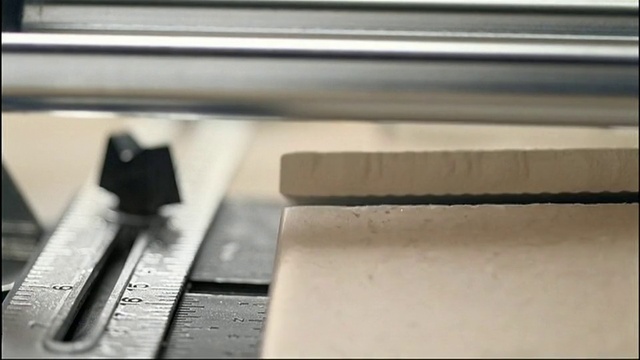 Video Reference: Wood, Grey, Office equipment, Musical instrument accessory, Gas, Parallel, Keyboard, Electronic device, Rectangle, Font