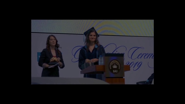 Video Reference: Microphone, Public address system, Podium, Projection screen, Spokesperson, Event, Electronic device, Font, Stage equipment, Public speaking