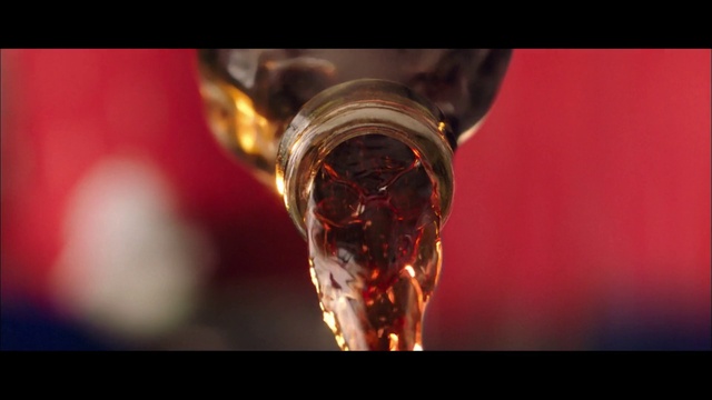 Video Reference: Water, Liquid, Drinkware, Stemware, Automotive lighting, Barware, Fluid, Amber, Glass bottle, Alcoholic beverage