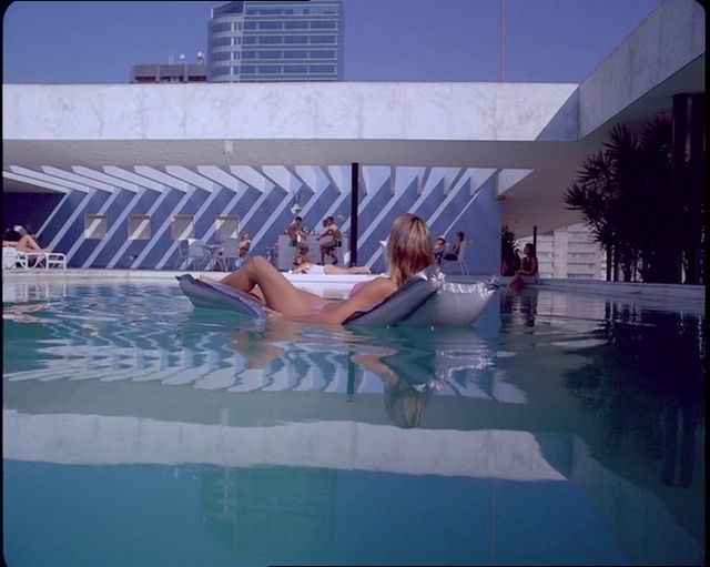 Video Reference: Water, Building, World, Azure, Swimming pool, Leisure, Aqua, Urban design, Sky, House