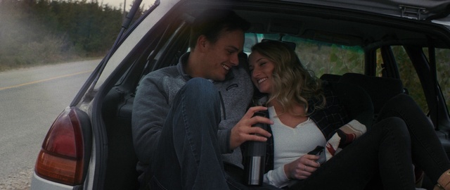 Video Reference: Hand, Smile, Car, Motor vehicle, Gesture, Automotive design, Microphone, Vehicle door, Automotive exterior, Happy
