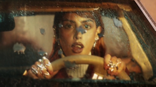 Video Reference: Lip, Eyebrow, Mouth, Eyelash, Flash photography, Art, Black hair, Jewellery, Wood, Fun