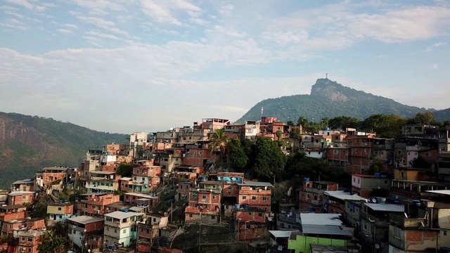 Video Reference: Cloud, Sky, Daytime, Building, Mountain, House, Window, Cityscape, Tree, Landscape