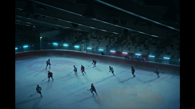 Video Reference: Field house, Ice rink, Ice skate, Sports equipment, Outdoor recreation, Winter sport, Player, Building, Skating, Ice skating
