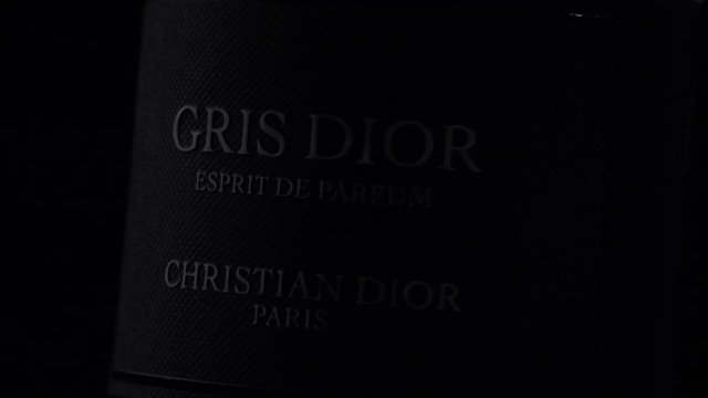 Video Reference: perfume, fragrance, bottle, label, luxury, cosmetics, beauty, dior, close-up, dark, product, packaging