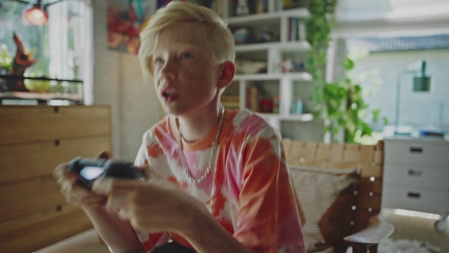 Video Reference: Plant, Mobile phone, Wood, Houseplant, Event, Happy, Communication Device, Musical instrument, Fun, Sitting