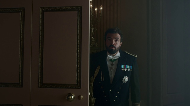 Video Reference: Coat, Military person, Dress shirt, Gesture, Military uniform, Bow tie, Suit, Non-commissioned officer, Collar, Tie