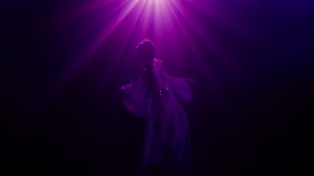 Video Reference: Microphone, Hand, Plant, Arm, Concert, Purple, Sky, Musician, Human body, Tree