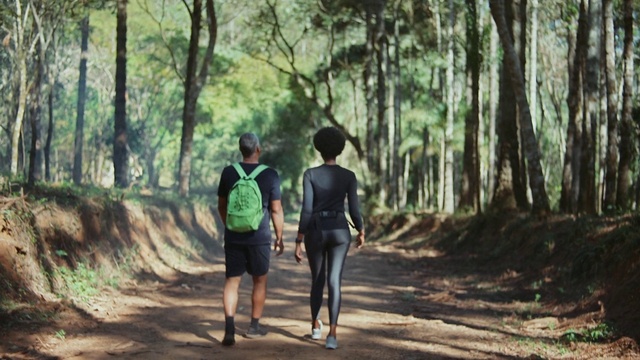 Video Reference: Plant, People in nature, Tree, Natural landscape, Wood, Gesture, Shorts, Trunk, Grass, Landscape