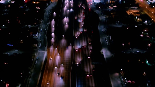 Video Reference: Building, Automotive lighting, Plant, Tower block, Mode of transport, Architecture, Thoroughfare, Cityscape, Road, City
