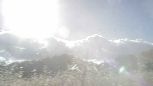 Video Reference: Sky, Cloud, Mountain, Highland, Slope, Cumulus, Mountainous landforms, Geological phenomenon, Landscape, Hill