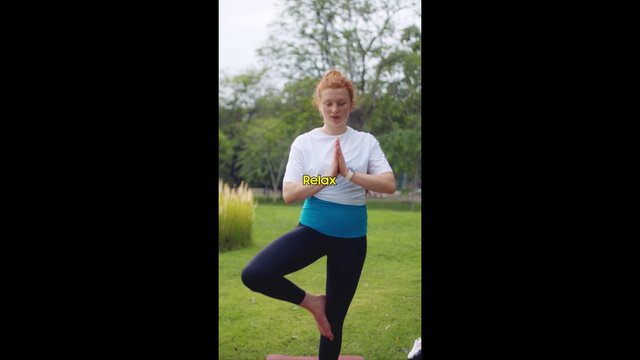 Video Reference: yoga, tree pose, outdoor, park, fitness, exercise, meditation, balance, woman, standing pose, grass, wellness, relaxation, nature, workout