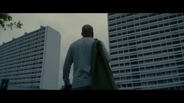 Video Reference: Building, Flash photography, Sleeve, Grey, Tower block, Skyscraper, Font, City, Sky, Formal wear