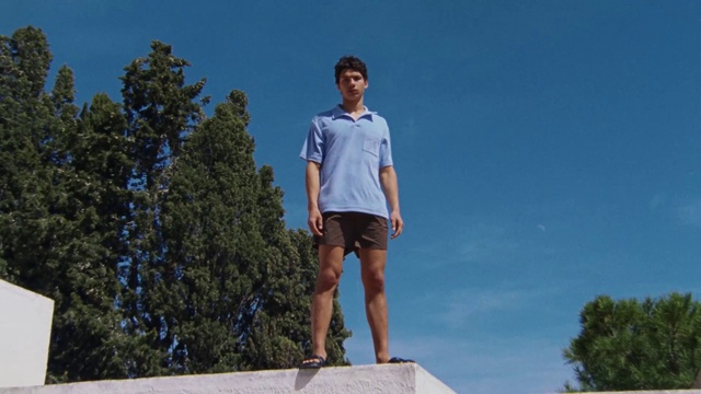 Video Reference: Sky, Active shorts, Shorts, Bermuda shorts, Tree, Leisure, T-shirt, Recreation, Happy, Balance