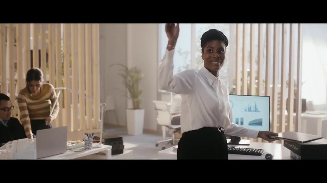 Video Reference: Joint, Shirt, Computer, Table, Plant, Standing, Personal computer, Laptop, Adaptation, Office equipment
