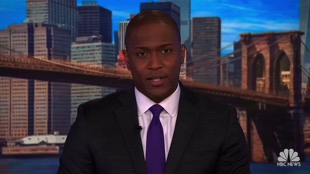 Video Reference: Property, World, Dress shirt, Tie, Collar, Skyscraper, Building, Suit, Real estate, Blazer