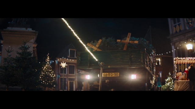 Video Reference: Building, Automotive lighting, Christmas tree, Electricity, Window, Vehicle, Street light, Security lighting, City, Midnight