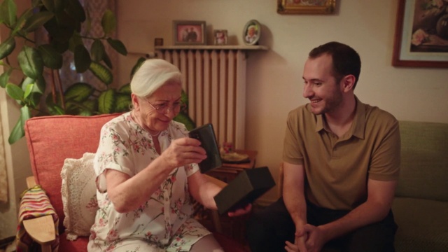 Video Reference: Hand, Picture frame, Comfort, Smile, Plant, Lap, People, Event, Fun, Sitting