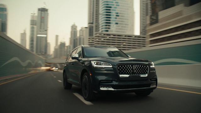 Video Reference: Wheel, Tire, Land vehicle, Vehicle, Car, Building, Grille, Automotive lighting, Automotive tire, Hood