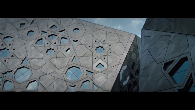 Video Reference: Azure, World, Triangle, Rectangle, Sky, Cloud, Automotive design, Font, Urban design, Tints and shades