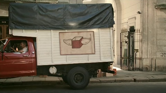 Video Reference: Wheel, Tire, Motor vehicle, Wood, Truck, Vehicle, Window, Art, Neighbourhood, Light commercial vehicle